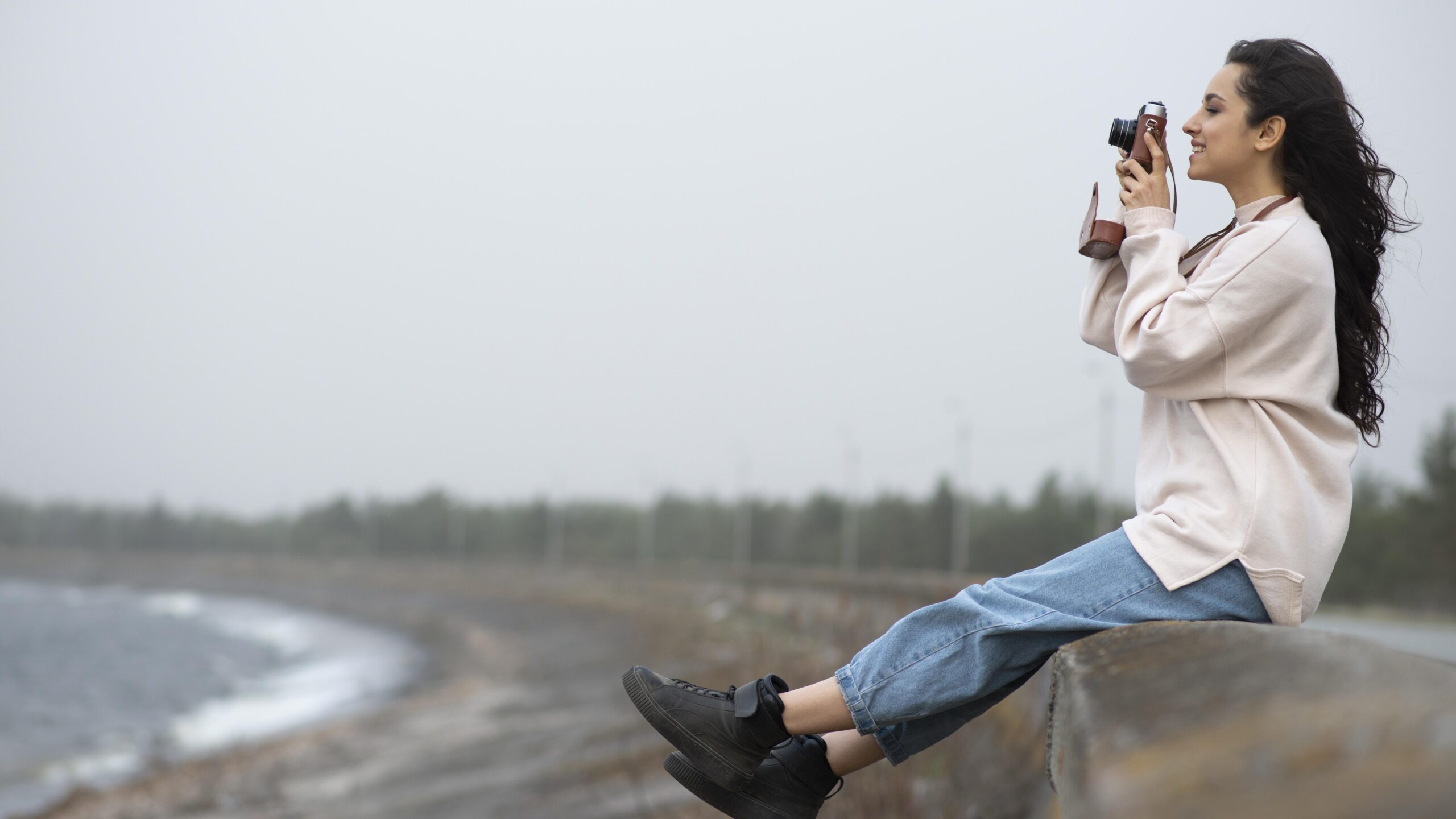 side-view-woman-taking-photos