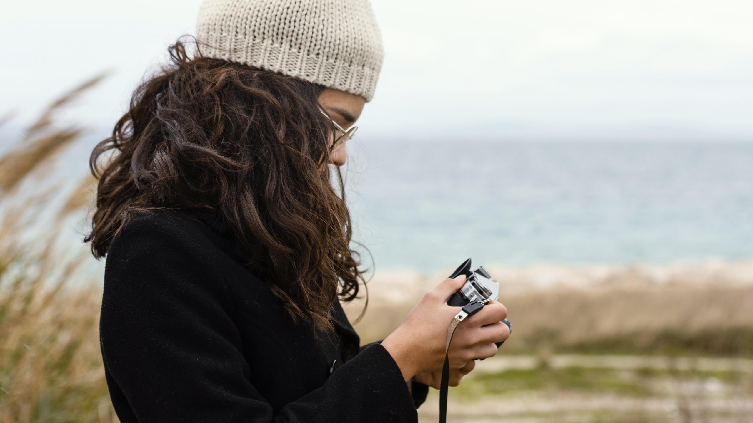 young-beautiful-woman-nature-with-camera